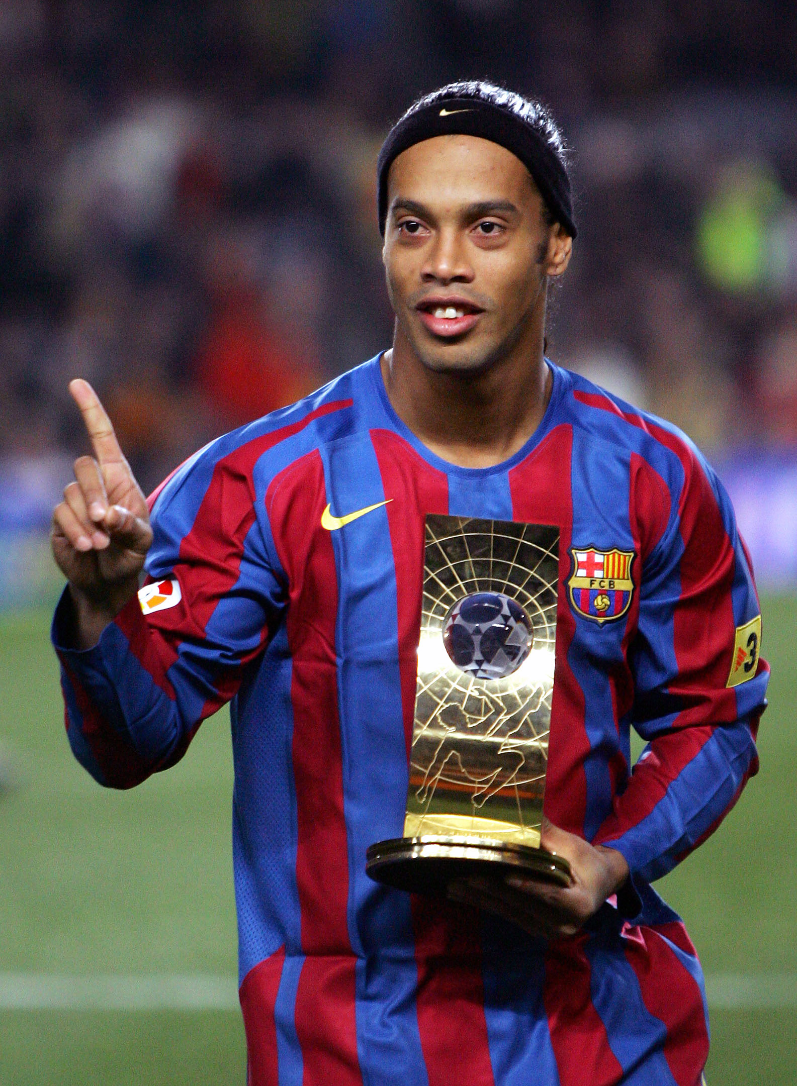 Barcelona's Ronaldinho of Brazil shows his FIFA world player 